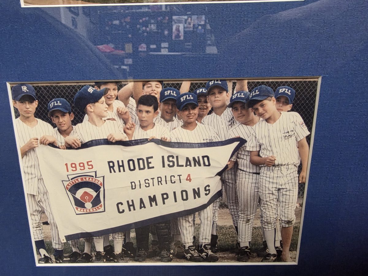 Scituate/Foster Little League team holding a 1995 Rhode Island District 4 Champions banner